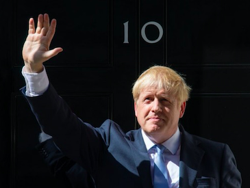 Boris Johnson arrives at 10 Downing Street (title). Credit: ITV/Dominic Lipinski/PA