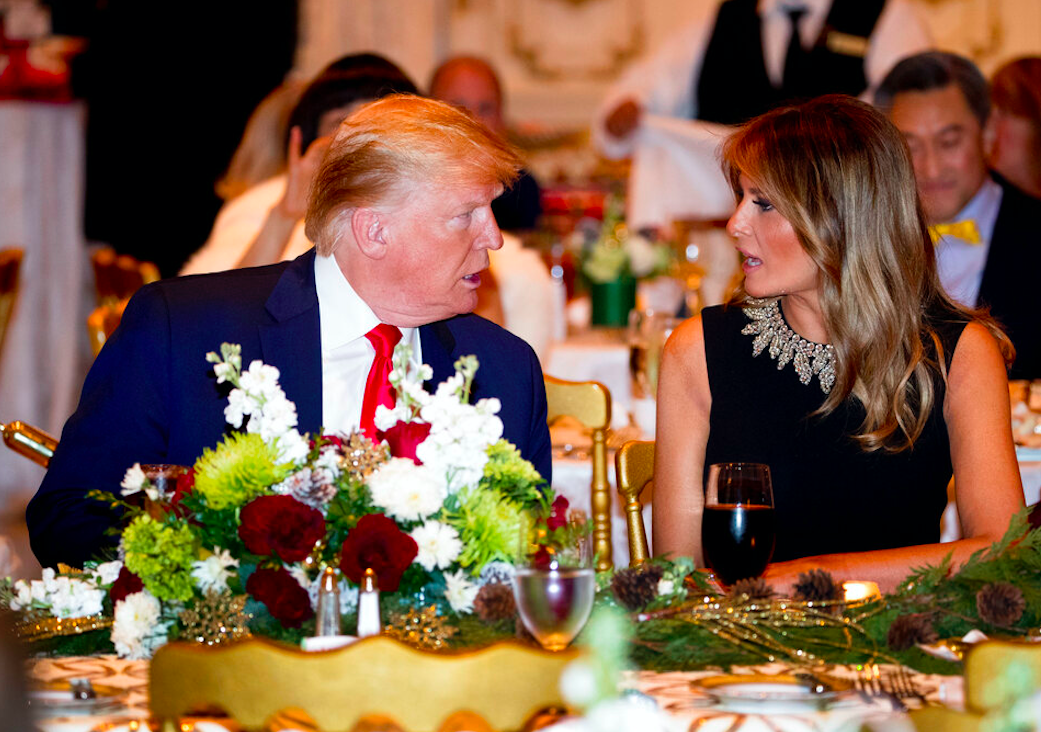 President Donald Trump and first lady Melania Trump at Mar-a-lago for Christmas Eve dinner in Palm Beach, FL. Credit: AP/Andrew Harnik