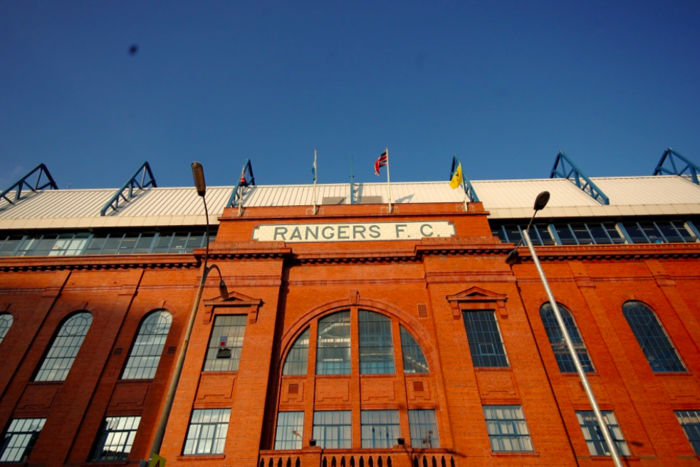 The Ibrox stadium in the sun. Credit to PA