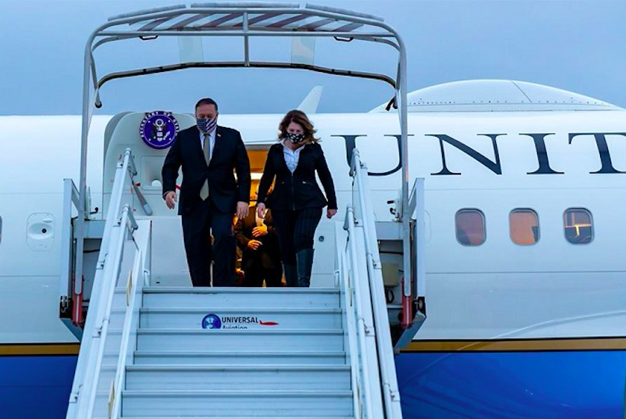 'US Secretary of State Michael R. Pompeo (L) and his wife Susan step off a plane as they arrive in Paris, France, on 14 November 2020. Credit to EFE/EPA/US Department of State