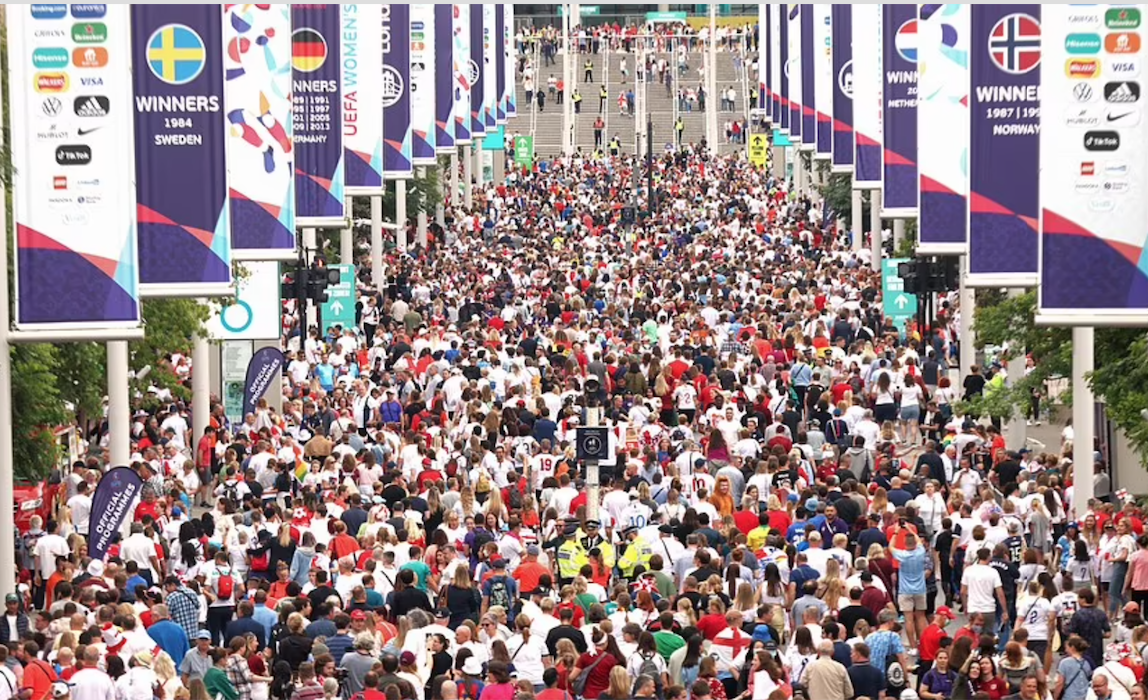 Fans arriving at Wembley Way before the UEFA Women's Euro 2022 final before the action kicked off at 5pm. Credit to PA