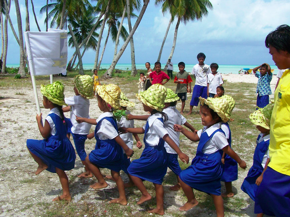 Kiribati children marching in Nth Tarawa, Independence Celebrations, 15 July 2009. Credit: Goodsams Australia