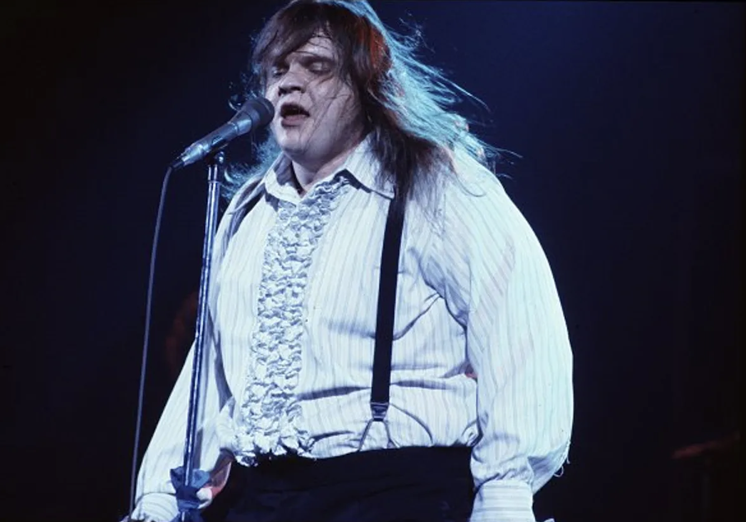 Meat Loaf performing on stage during the Bat Out Of Hell Tour, USA, March 1978. Credit to Getty Images