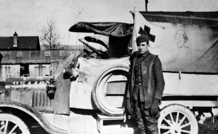 Walt Disney next to his ambulance in France. Credit to Walt Disney Archives