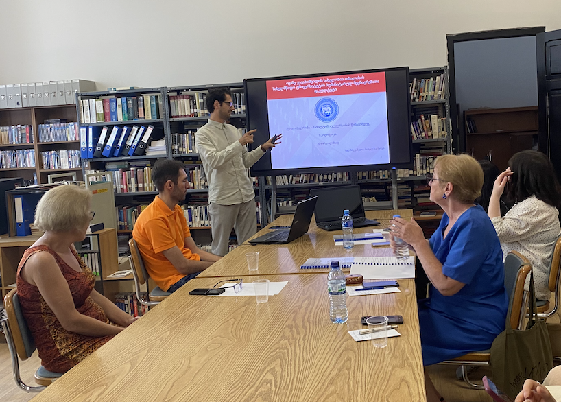 Doctoral student George Labadze gives his colloquium at TSU. Credit to BRAMS Institute.png