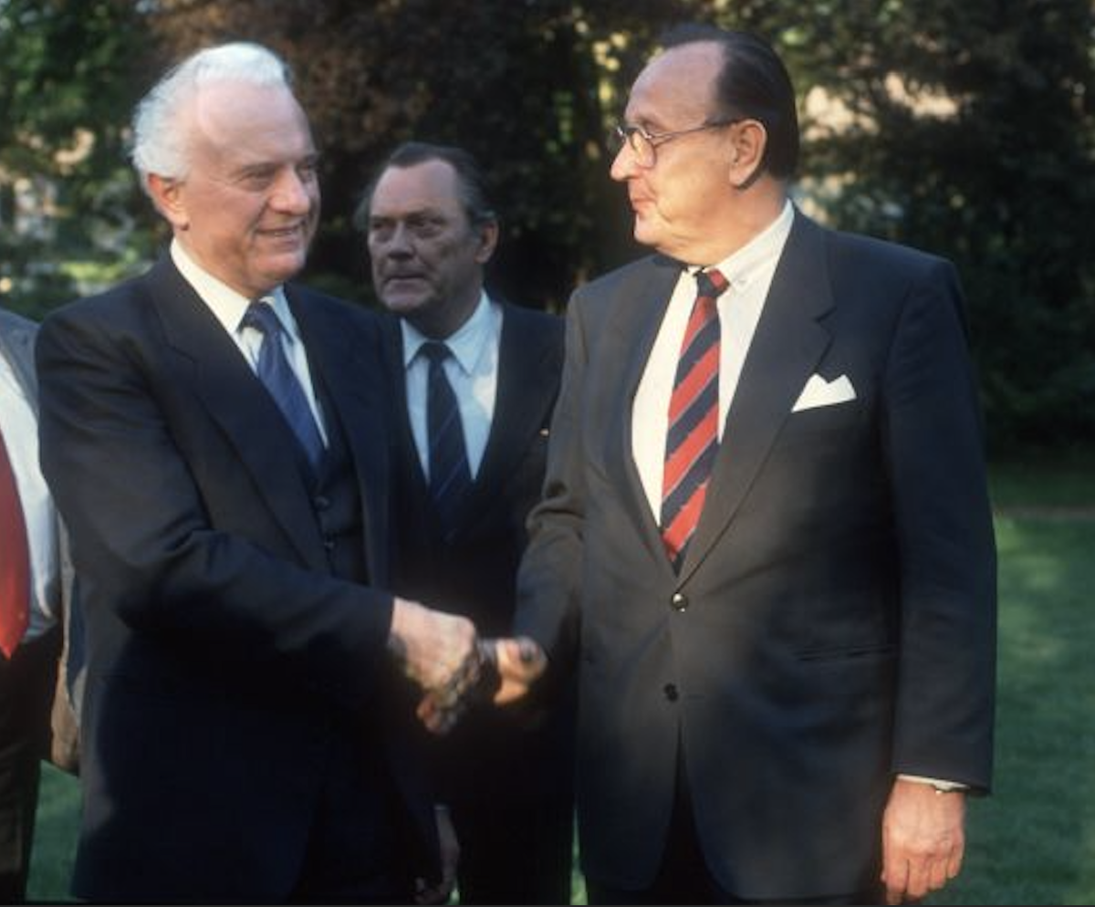 German Minister of Foreign Affairs Hans-Dietrich Genscher (R) is meeting the Foreign Minister of the Soviet Union Eduard Schewardnadse (L) at the 2+4 meeting on 1 April 1990, Paris, France. Credit to Thomas Imo/Photothek via Getty Images