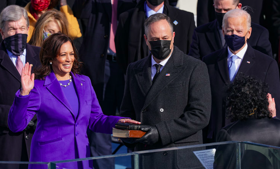 Kamala Harris sworn in as VP by US Supreme Court Associate Justice Sonia Sotomayor as her husband Doug Emhoff and Joe Biden stand beside in support. Credit to Alex Wong/Getty Images