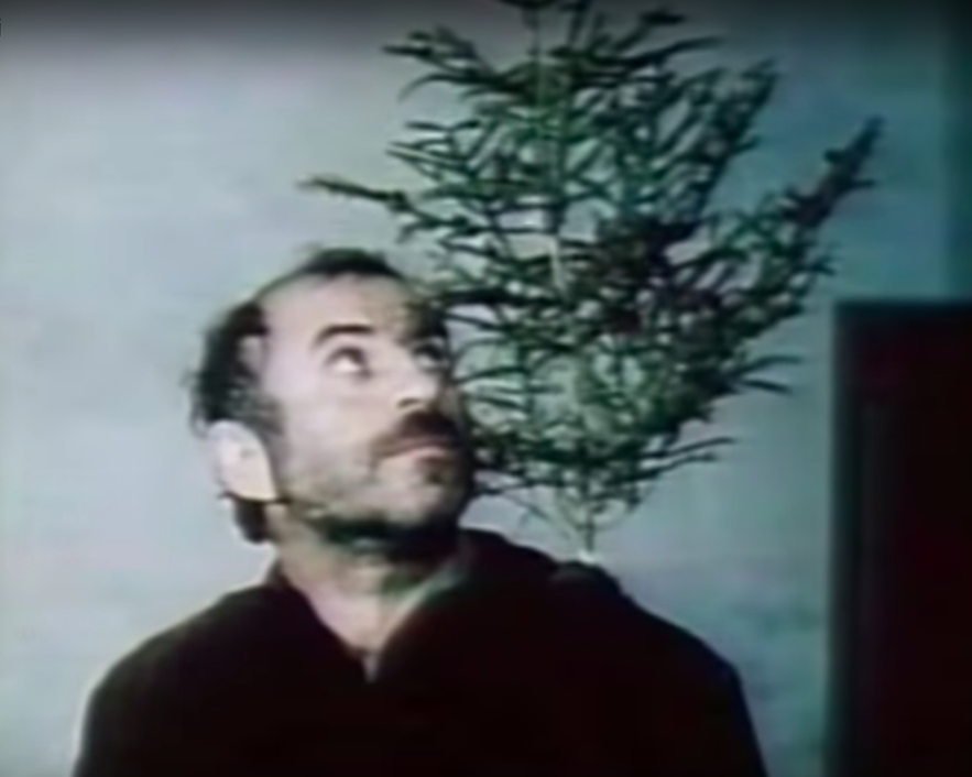 The Letter to Firs (1986). Beri with a fir tree on his shoulder (actor - Guram Petriashvili)