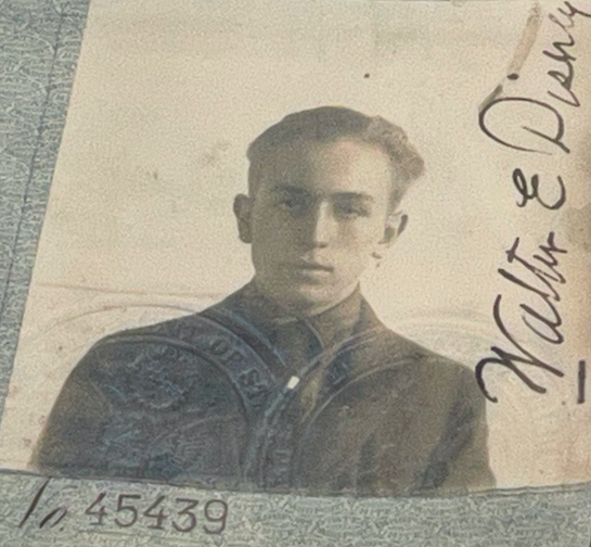 The passport photo of young Walt Disney from 1917. Credit to Walt Disney Archives