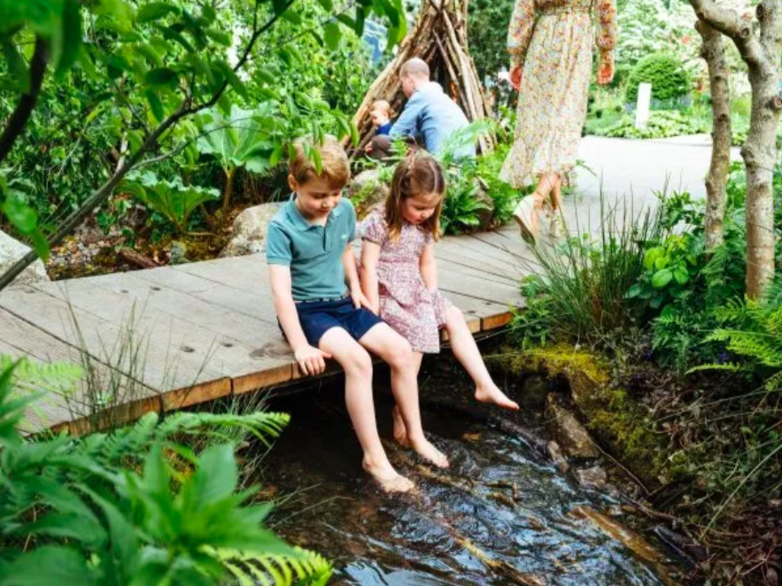 George and Charlotte as they inspected their mum’s Chelsea Flower Show garden. Credit: Rex