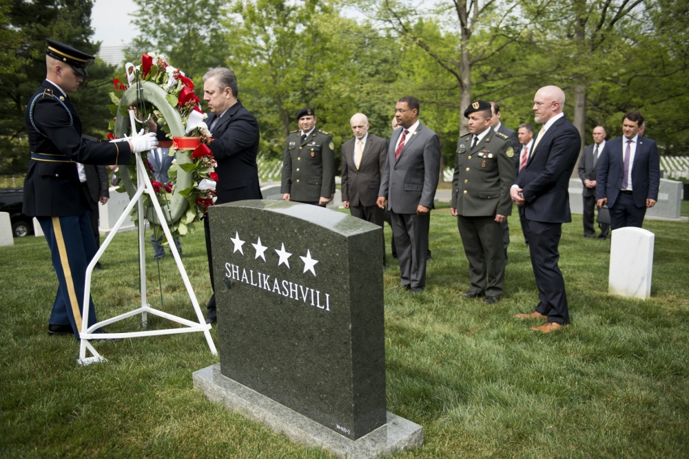 PM of Georgia Giorgi Kvirikashvili at the gravesite of Gen. John Shalikashvili (in Section 30 of Arlington National Cemetery) on 25 April 2016. Credit to Rachel Larue