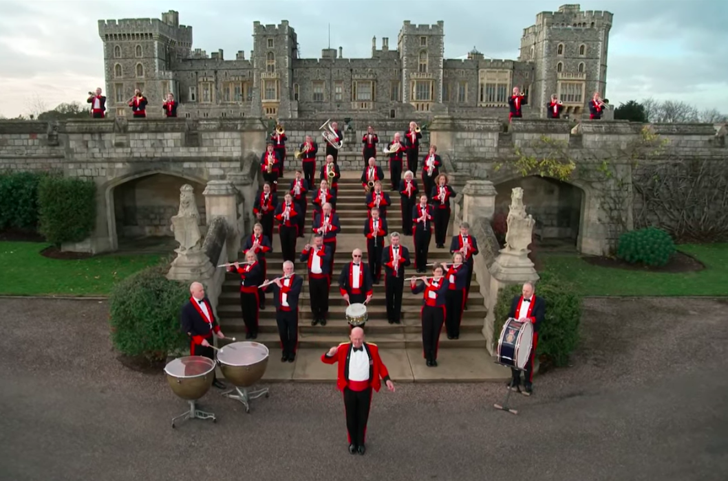 Central Band of the Royal British Legion, directed by David Cole, performed the National Anthem at the East Lawn Steps at Windsor Castle. Screengrab from the Royal Family's YouTube channel