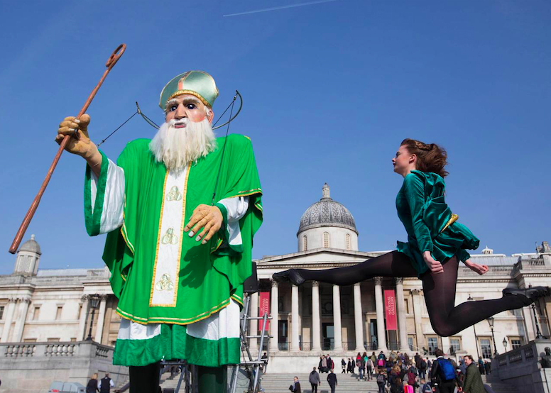 A 16ft tall puppet of St Patrick and an Irish dancer in Trafalgar Square. Credit: PA Archive/PA Images