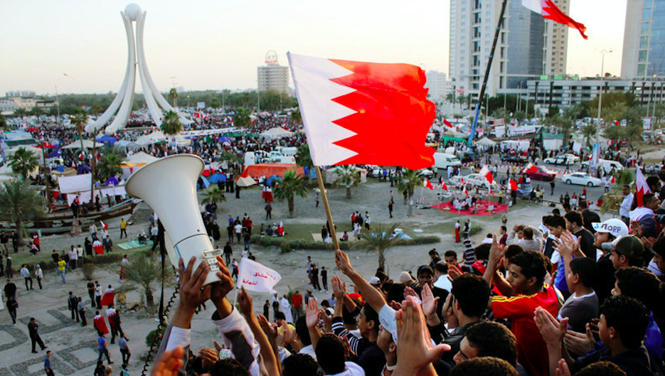 Bahraini protesters at the Pearl Roundabout in the capital Manama on 20 February 2011. Credit to John Moore/Getty Images