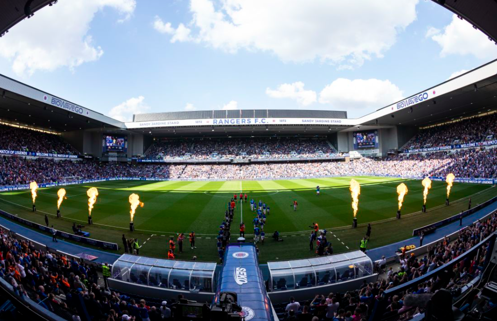 Both teams entering to the Ibrox stadium. Credit to The Rangers