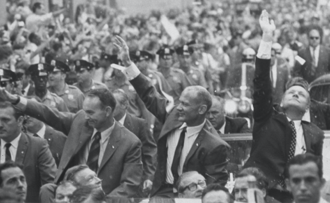 Collins, Aldrin, and Armstrong wave to crowds at a parade held in August 1969 celebrating their voyage. Credit: CNN