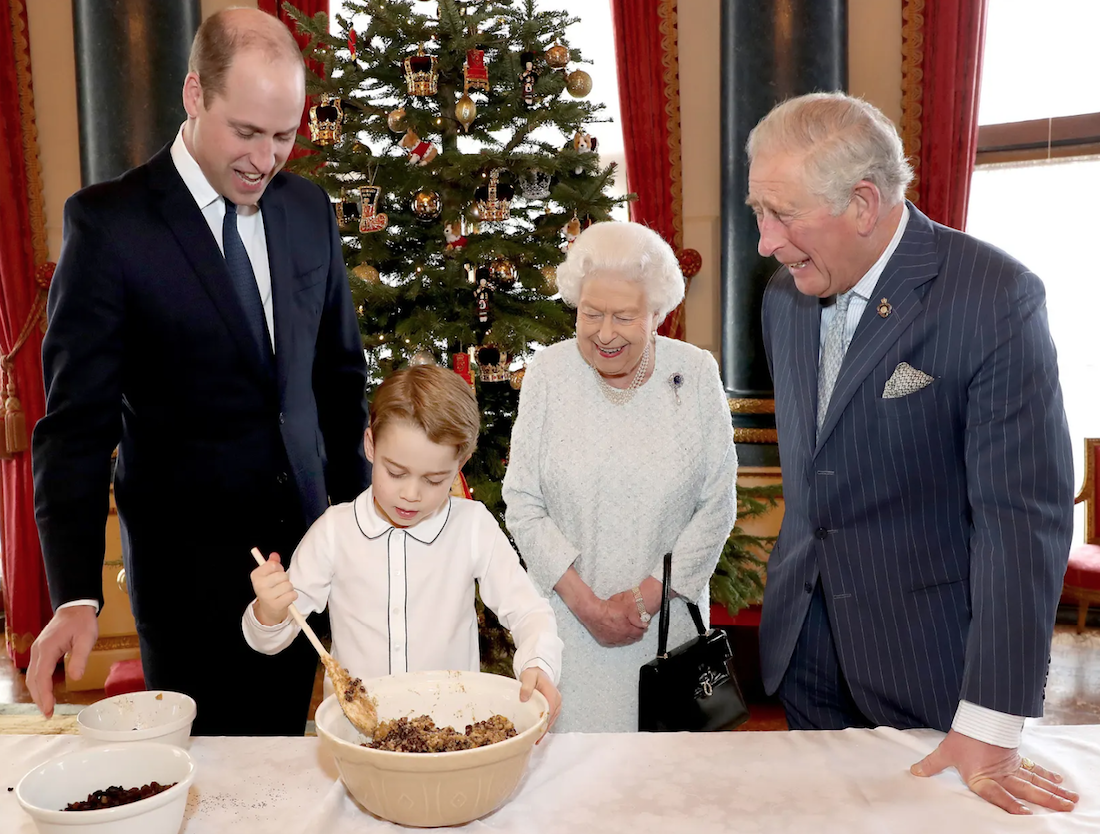 Prince William, Prince George, the Queen and Prince Charles prepare special Christmas puddings in the music room at Buckingham Palace in December, 2019. Credit to Chris Jackson/Buckingham Palace/Getty