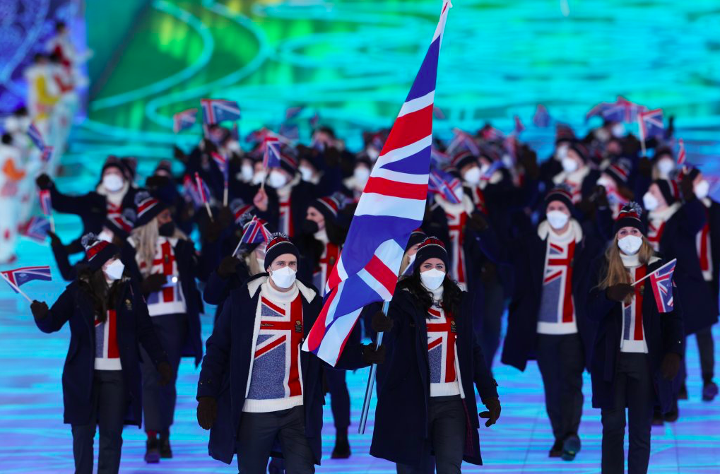 Flag bearers Eve Muirhead and Dave Ryding of Team Great Britain lead the team during the opening ceremony of the Beijing 2022 Winter Olympics. Credit to Getty Images