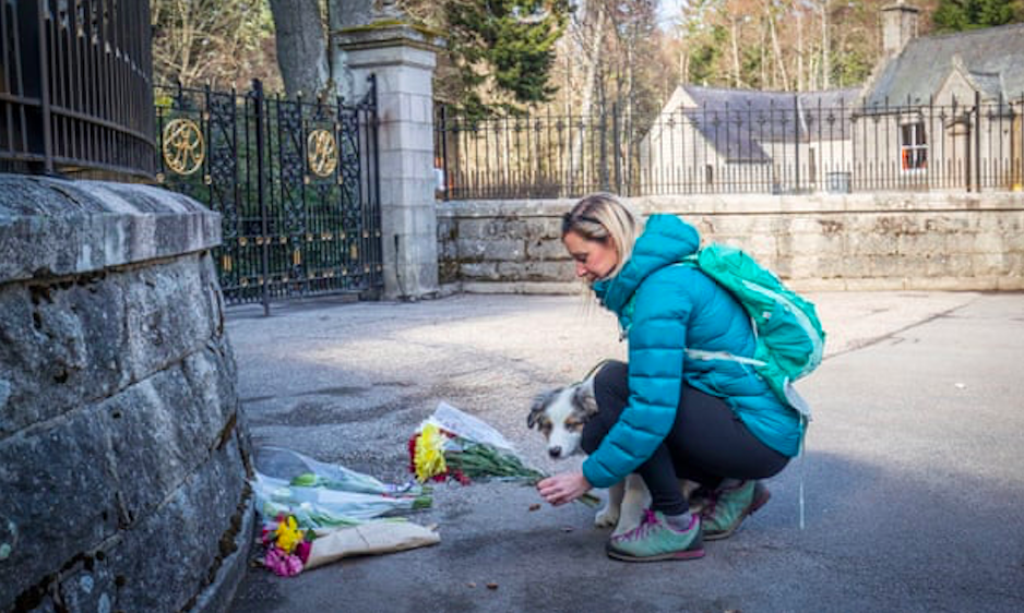 Outside Windsor Castle on Friday. Credit to Andrew Boyers/Reuters