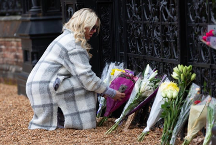 Residents and visitors lay flowers at Sandringham House in Norfolk. Credit to Terry Harris/Rex/Shutterstock