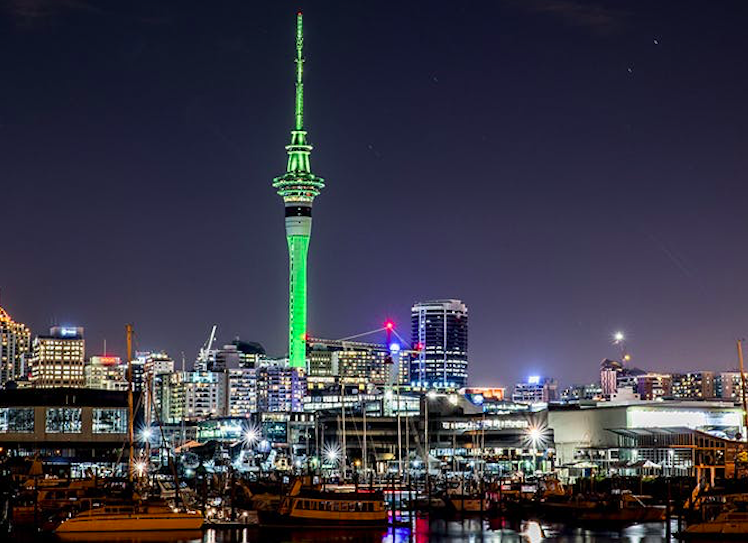 The greened Sky Tower dominates the Auckland skyline on the eve of St Patrick's Day in New Zealand. Credit: The Urban List