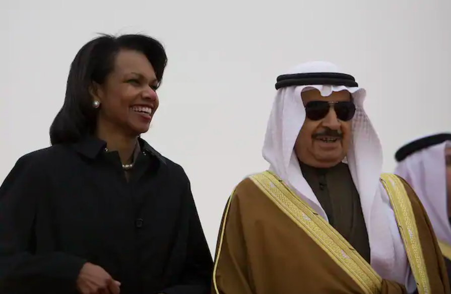 US Secretary of State Condoleezza Rice with PM of Bahrain Khalifa bin Salman al-Khalifa in 2008 during an arrival ceremony for President George W. Bush in Manama, Bahraini capital. Credit to Jim Watson/AFP/Getty Images
