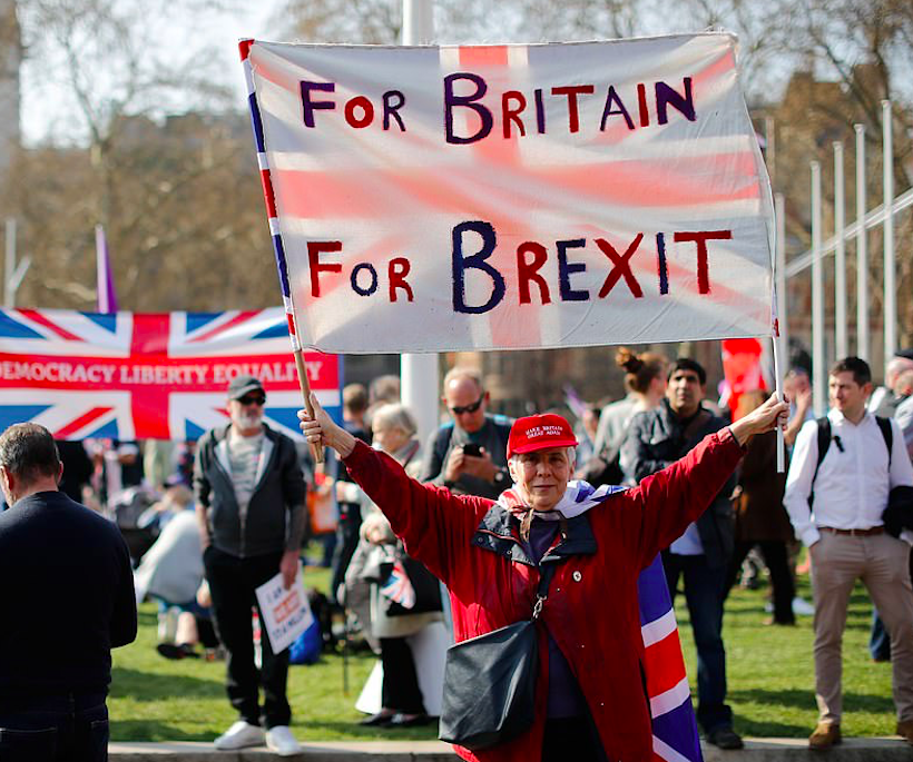 A British woman wearing a Trump MAGA hat. Credit: The Daily Mail/AFP/Getty Images