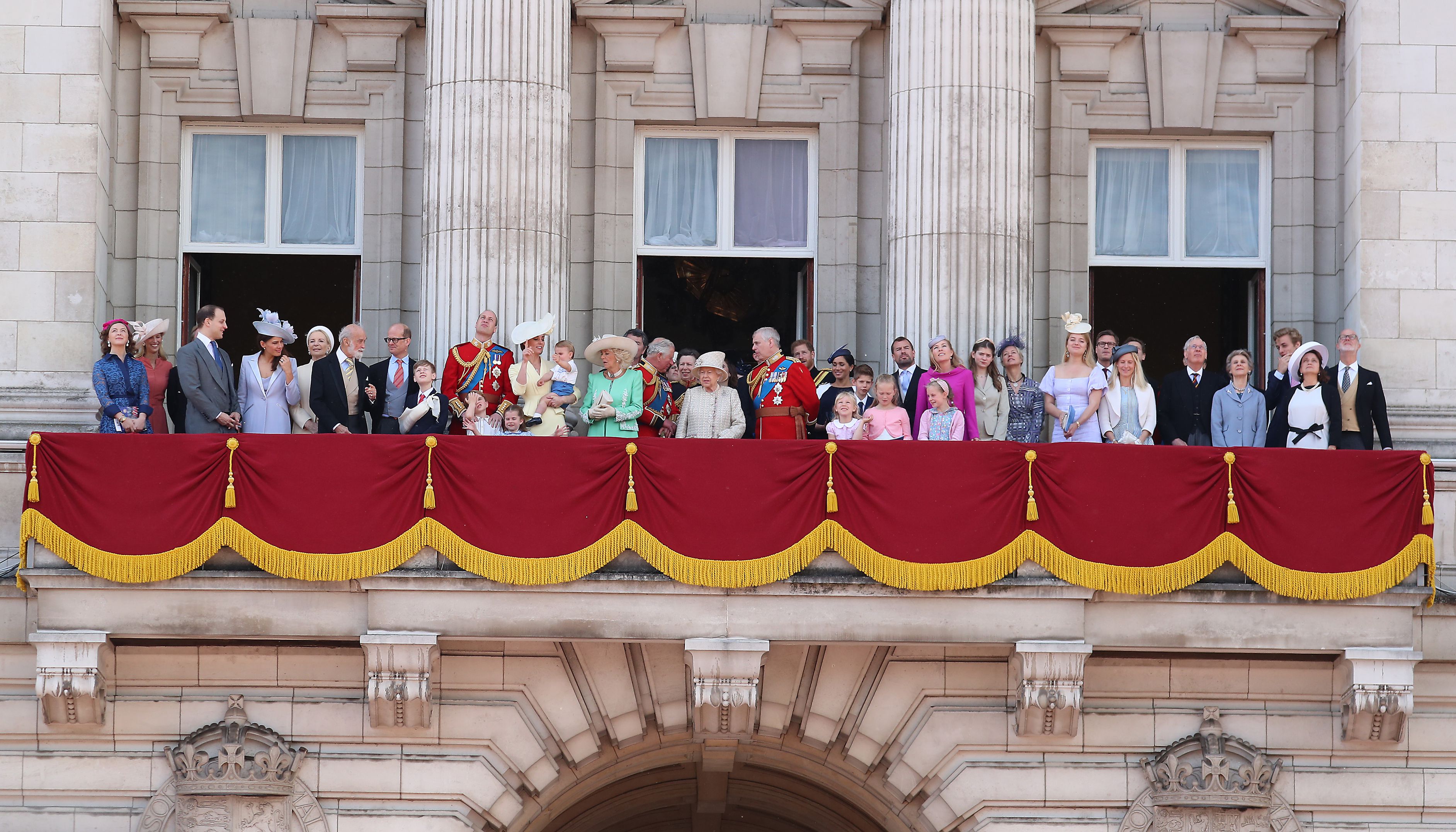 Royals gather on the Buckingham Palace balcony for the Royal Air Force flypast during Trooping the Colour. Credit: Harper's Bazaar/Getty Images
