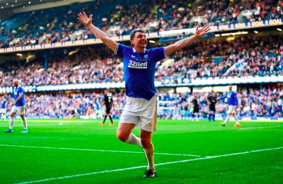 Shota Arveladze celebrates as he gives Rangers Legends a first-half lead. Credit to SNS Group