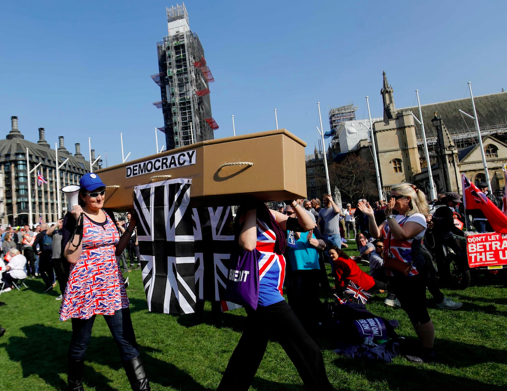 Democracy coffin in Parliament Square carried by Brexiteers. Credit: Tolga Akmen/AFP/Getty