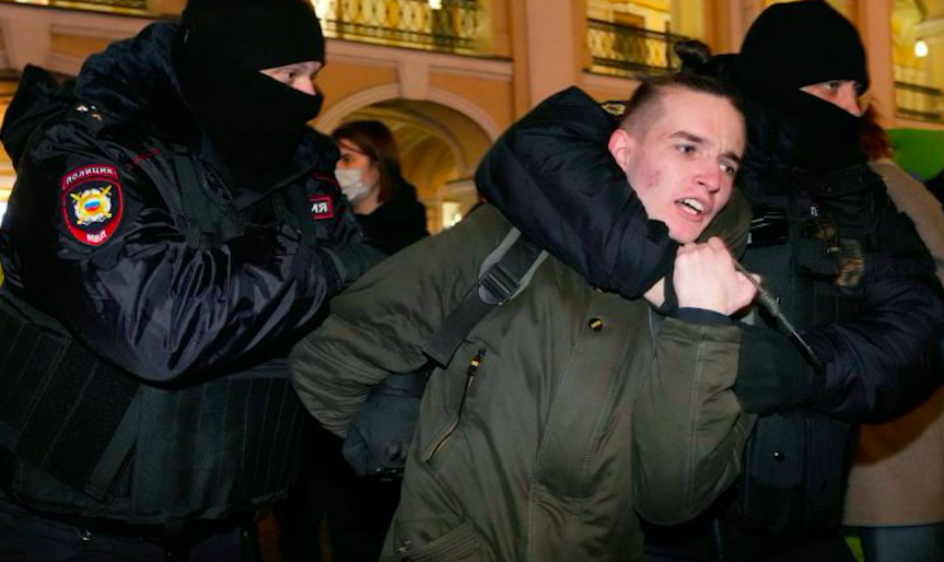 The arrest near Pushkin Square in Moscow, Russia, on 24 February. Credit to Dmitri Lovetsky/AP
