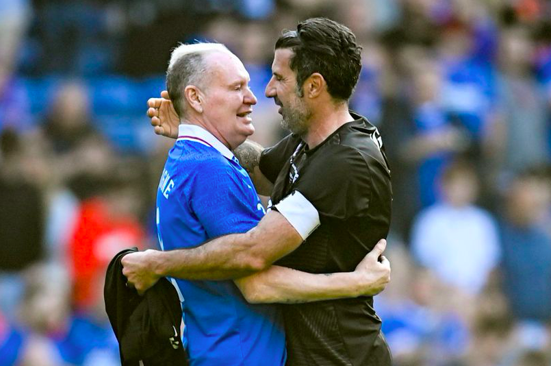 Paul Gascoigne (L) and Luis Figo (R) at the end of the game. Credit to SNS Group/Football Scotland