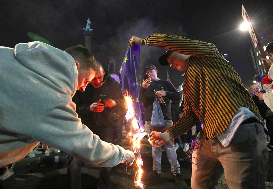 Burning the EU flag near Nelson’s Column in Trafalgar Square was symbolic. Credit The Daily Mail/PA