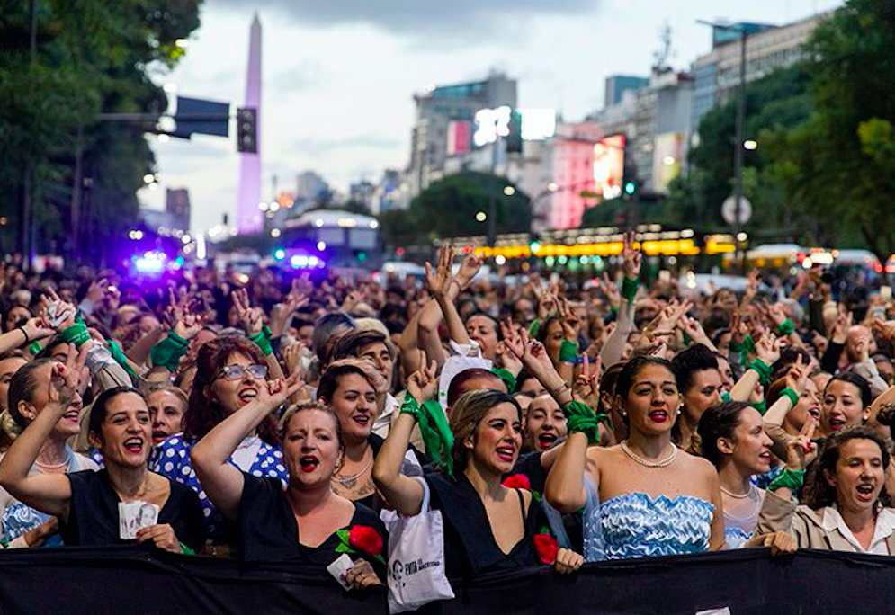 The 100 "Evitas" – Women dressed as Eva Peron parade down the streets of Buenos Aires on Monday. Credit: Buenos Aires Times